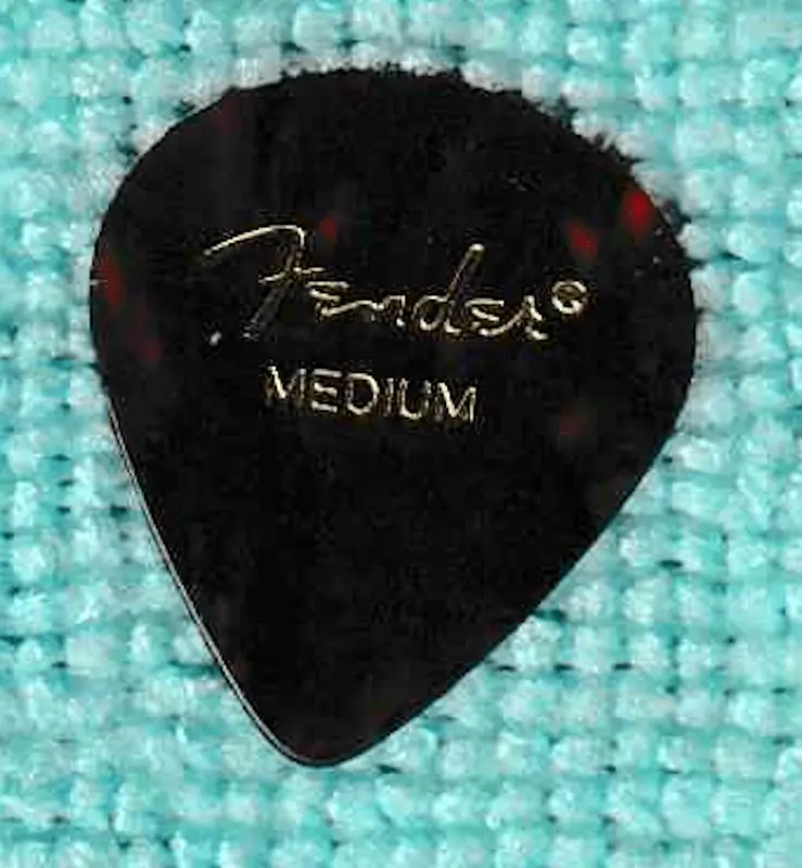 A classic Example of a Celluloid Medium D'Andrea #551 pick but made by Fender Guitar Company.