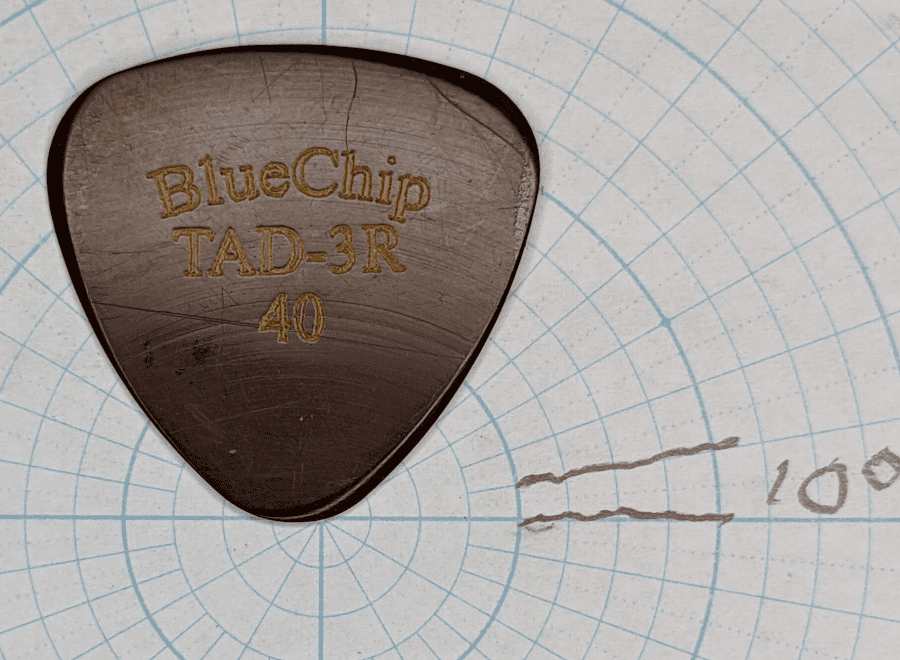 The Illustrious Blue Chip Brand TAD-3R Plectrum on top of 360 degree Angle Paper