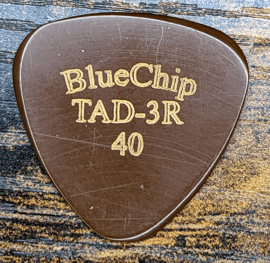 The Blue Chip Brand Model TAD-3R on a wood background Showing the bevels