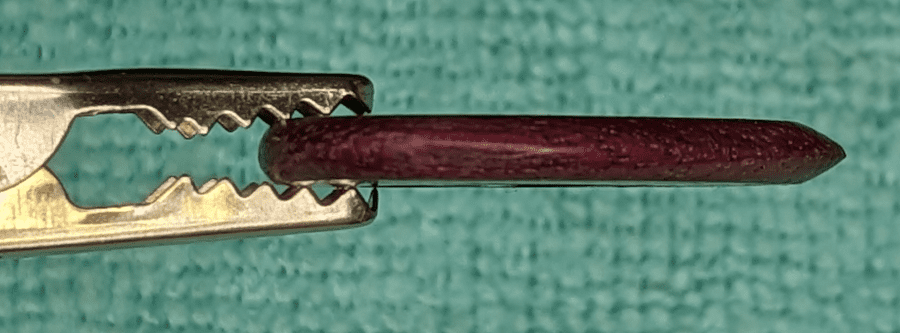 Edge-On viewpoint of the Wooden Ploutone Purple Heart Wood Pick
