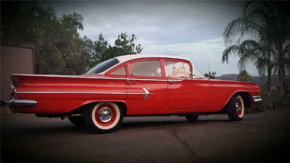 Red and White 1960's Bel Air Automotive with 'Sleek styling'.