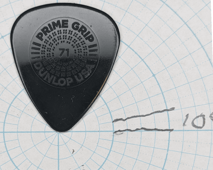 Dunlop Prime Grip Delrin 500 At Pt 71 On Angle Paper. Is this an ugly pick, and if it is, does it play beautifully, or hideously?