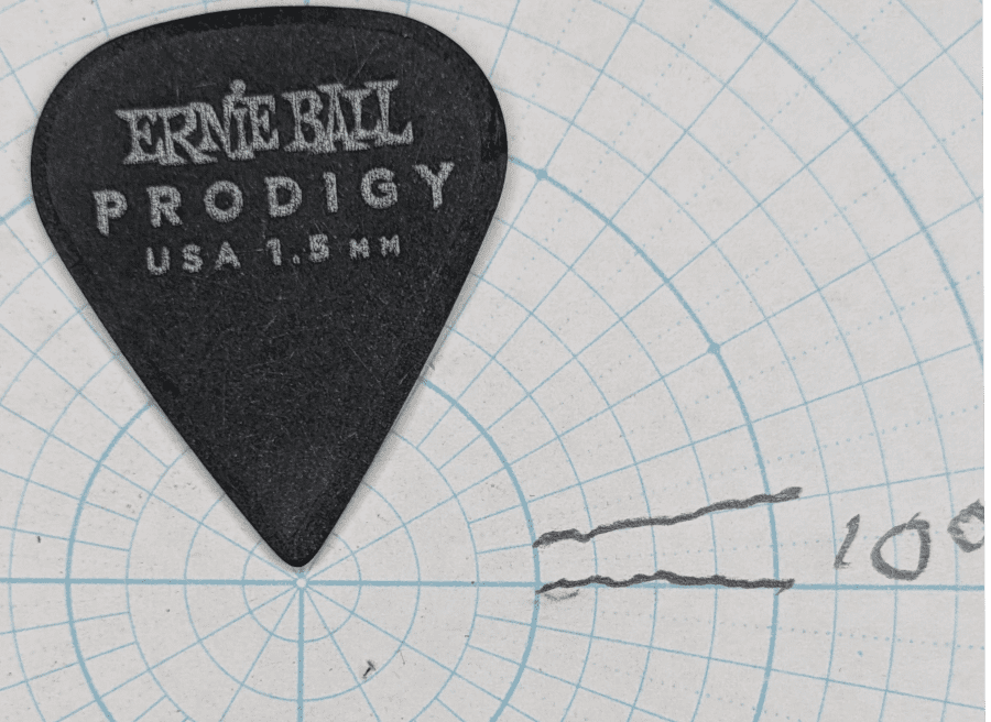 The Ernie Ball Prodigy Sharp Model against Angle Paper. Note the sharp angular fashioning of the tip and shoulders. A fine tip.