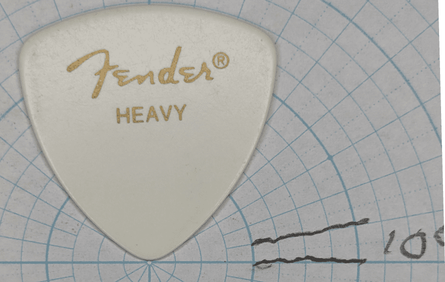 Fender Medium White 346 Tri-Tip on Angle Paper. The original 346 Shaped Tri-Tip with background of Angle Paper for shape reference. Celluloid.